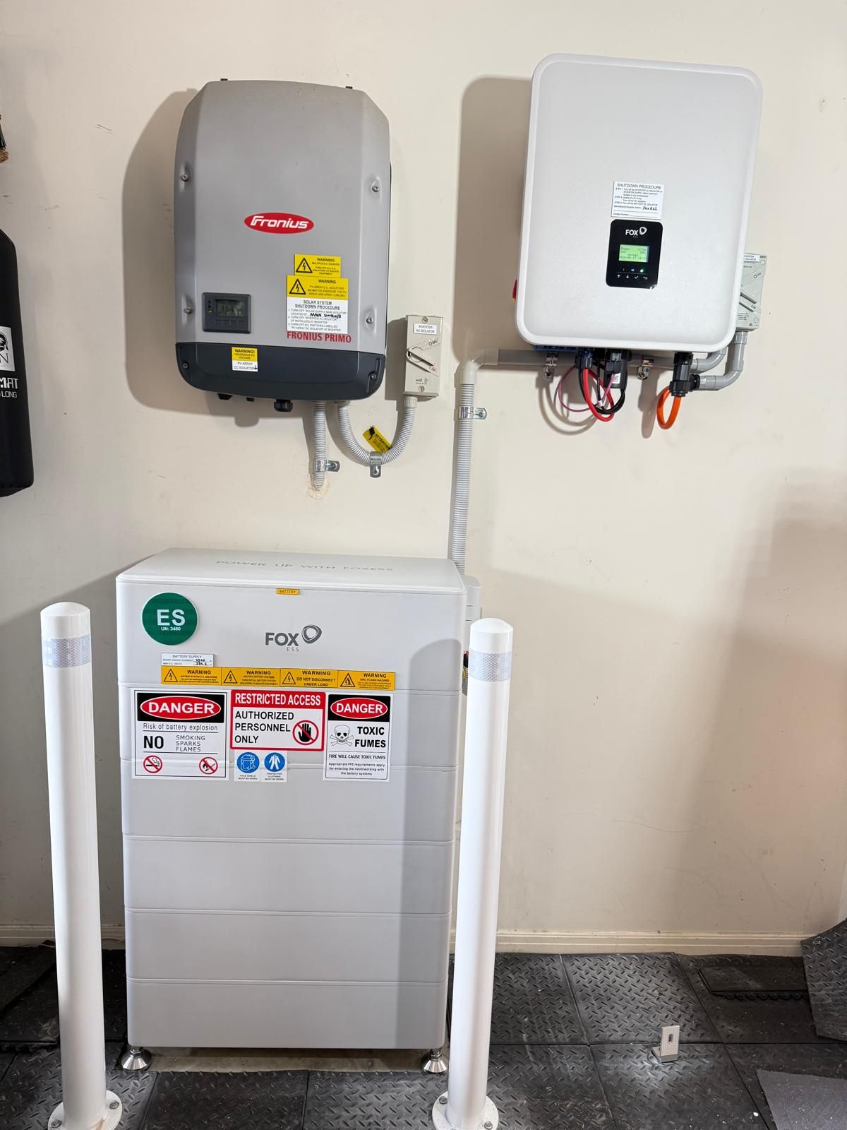 Fox ESS battery retrofitted beside an existing Fronius solar inverter